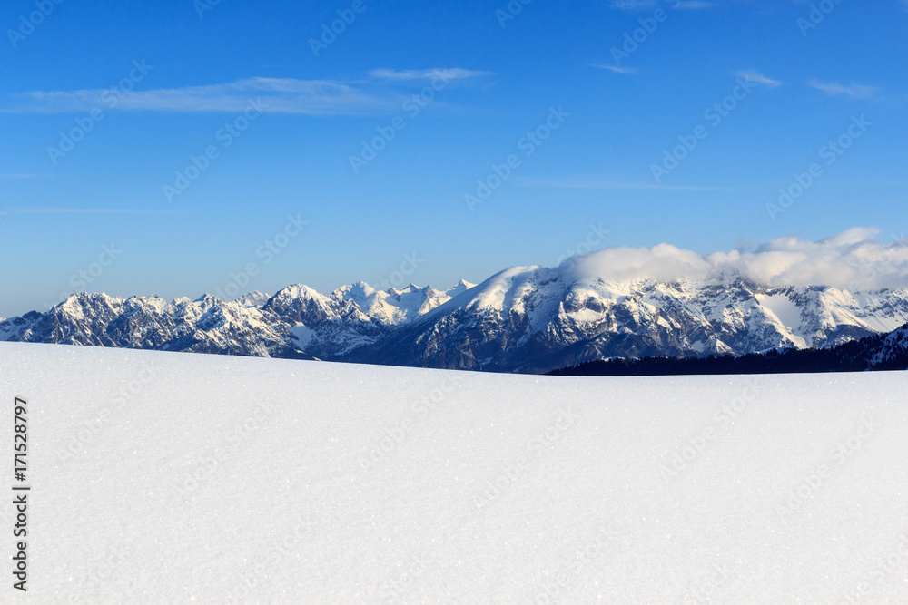 Mountain panorama with snow and blue sky in winter in Stubai Alps, Austria