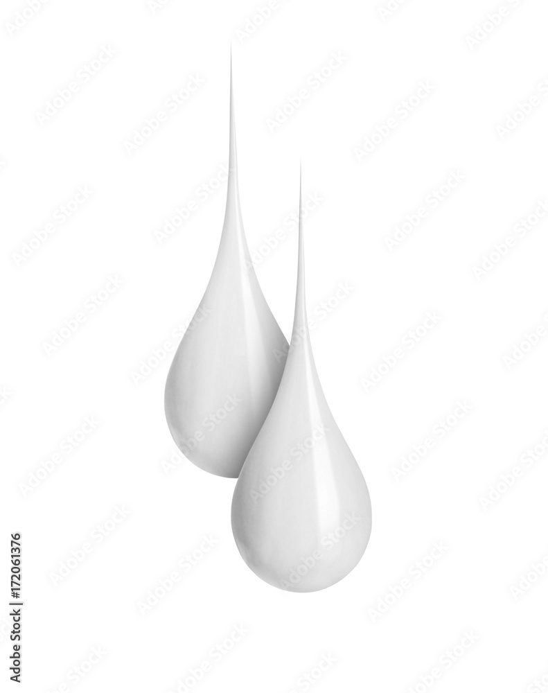 Two milk drops close-up isolated on white background