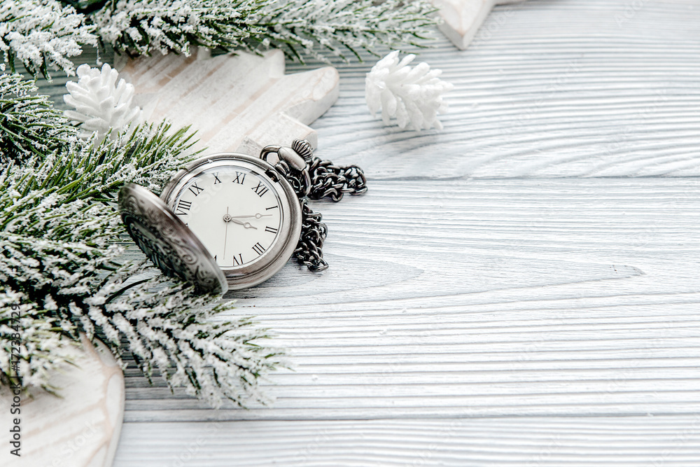 new year on wooden background with watch top view