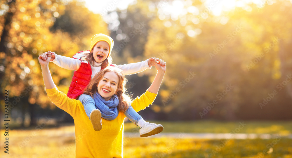 happy family mother and child daughter on   autumn walk