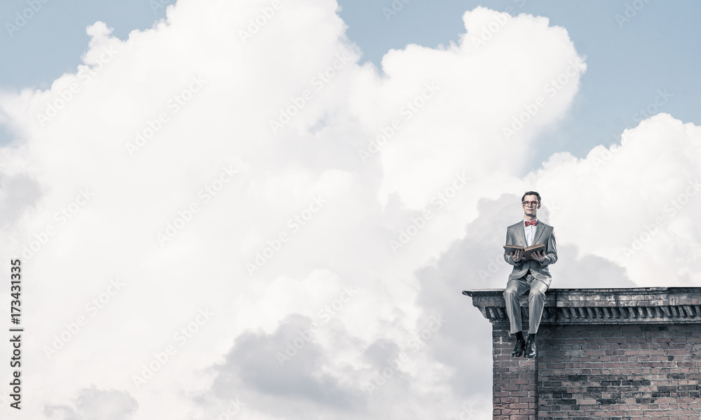 Young businessman or student studying the science on building ro