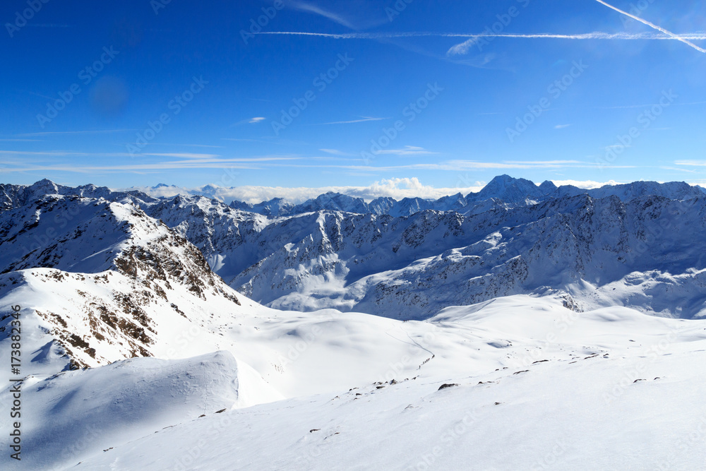 Mountain panorama with snow and blue sky in winter in Stubai Alps, Austria