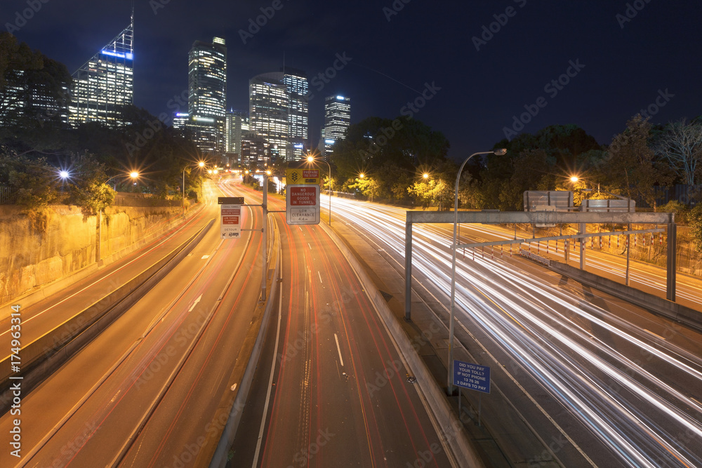 Multi lane cross city highway in Sydney, Australia, from above towards city CBD.