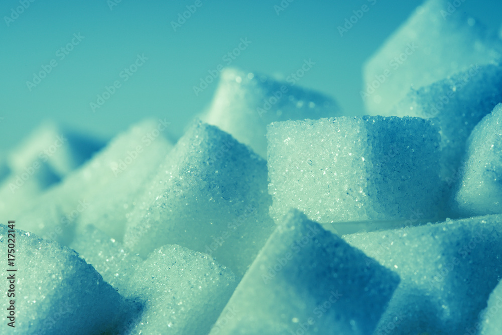 Close up the sugar cubes with blue color tone