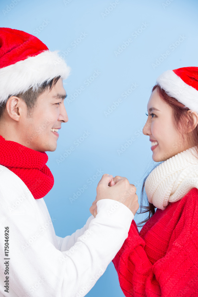 couple smile with merry christmas