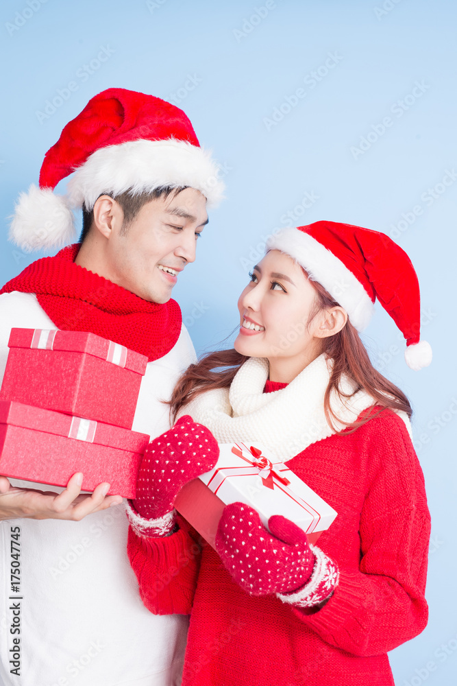 couple smile with merry christmas