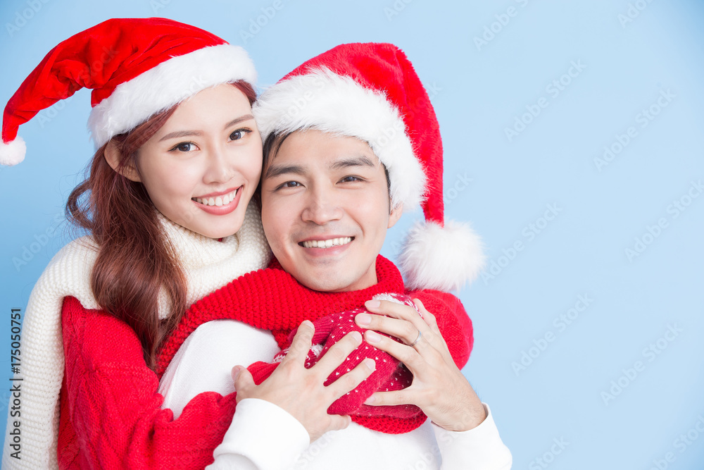 couple smile with merry christmas