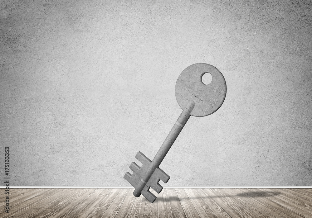 Conceptual background image of concrete key sign in room with wooden floor