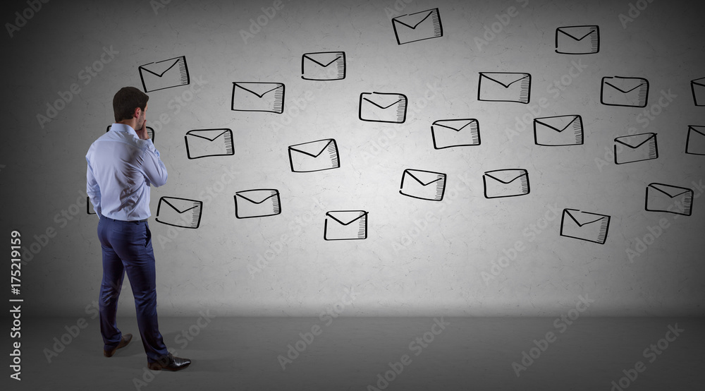 Businessman watching emails sketch on a wall 3D rendering