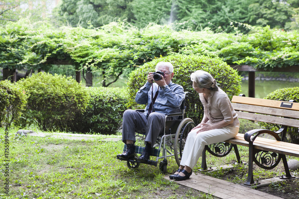 An old couple is crazy about the camera