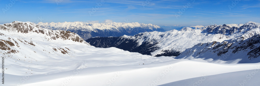 Mountain panorama with snow and blue sky in winter in Stubai Alps, Austria