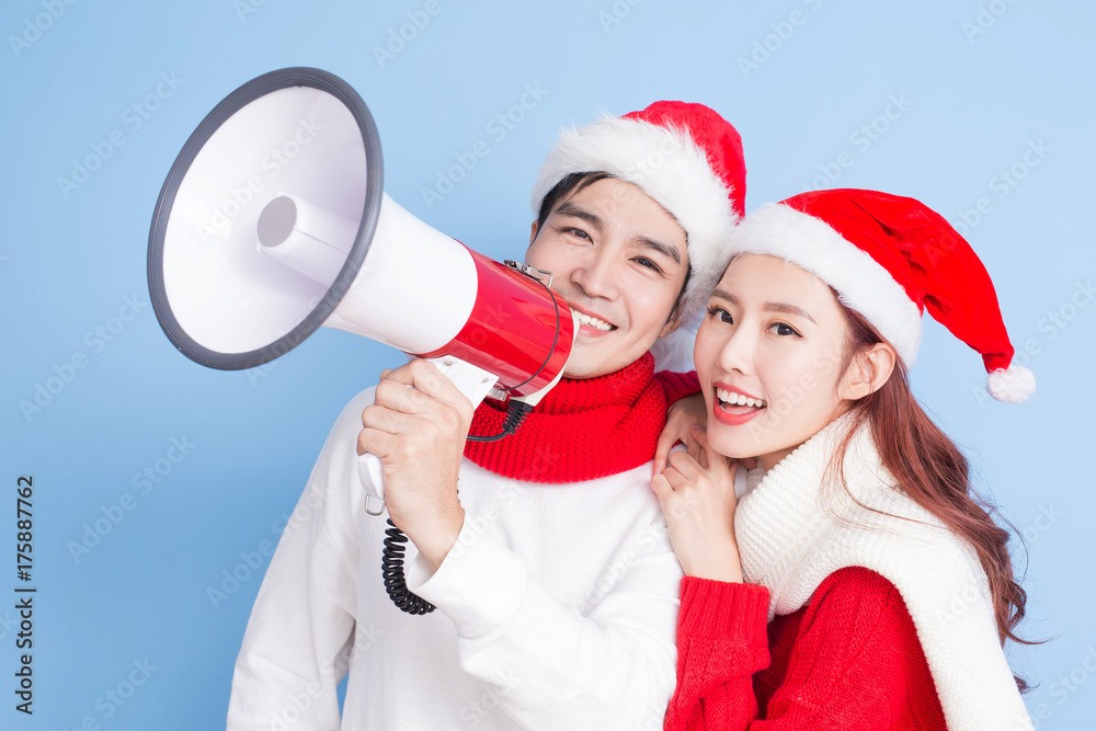 couple smile with merry christmas