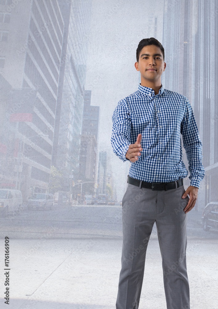 Businessman offering to shake hands in city