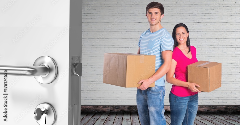 people moving boxes into new home