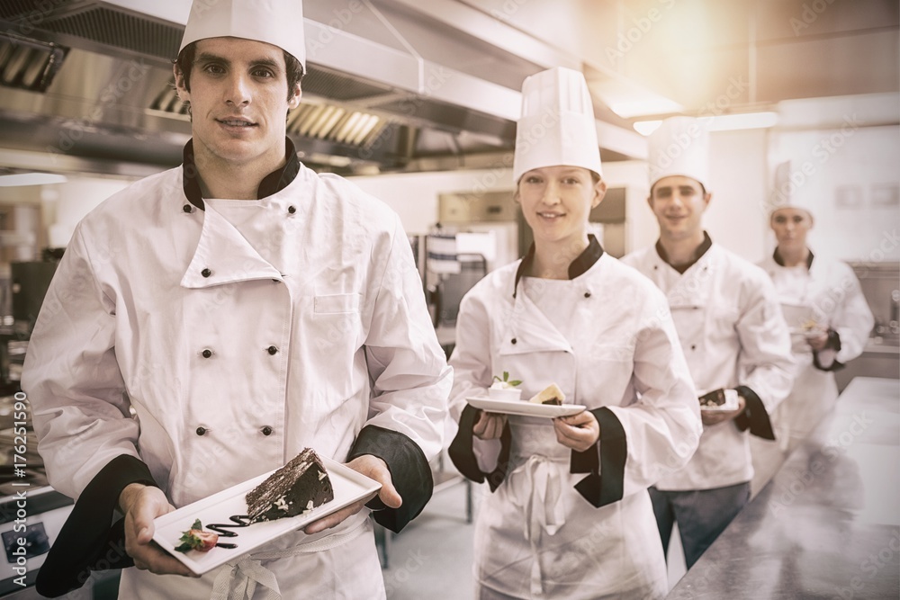 Chefs presenting deserts