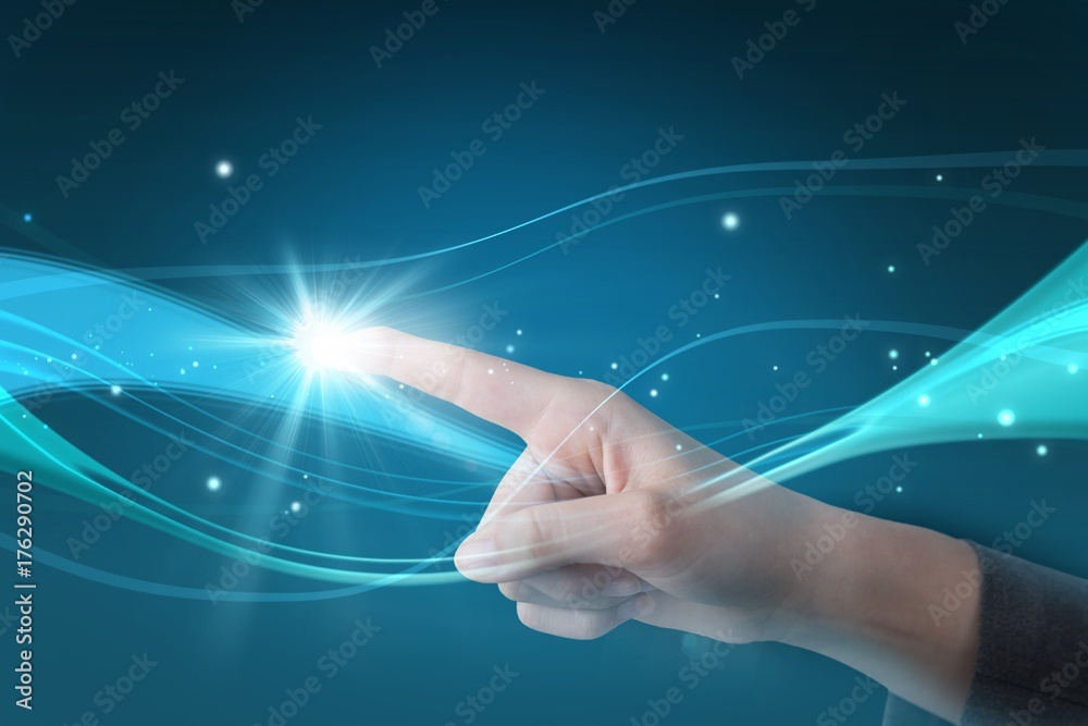 Composite image of hand pointing against blue background