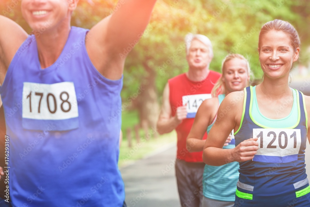 Marathon male athlete crossing the finish line