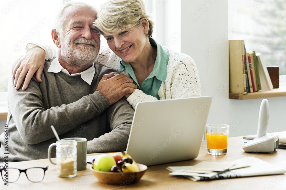 Modern grandparents chatting with their granddaughter