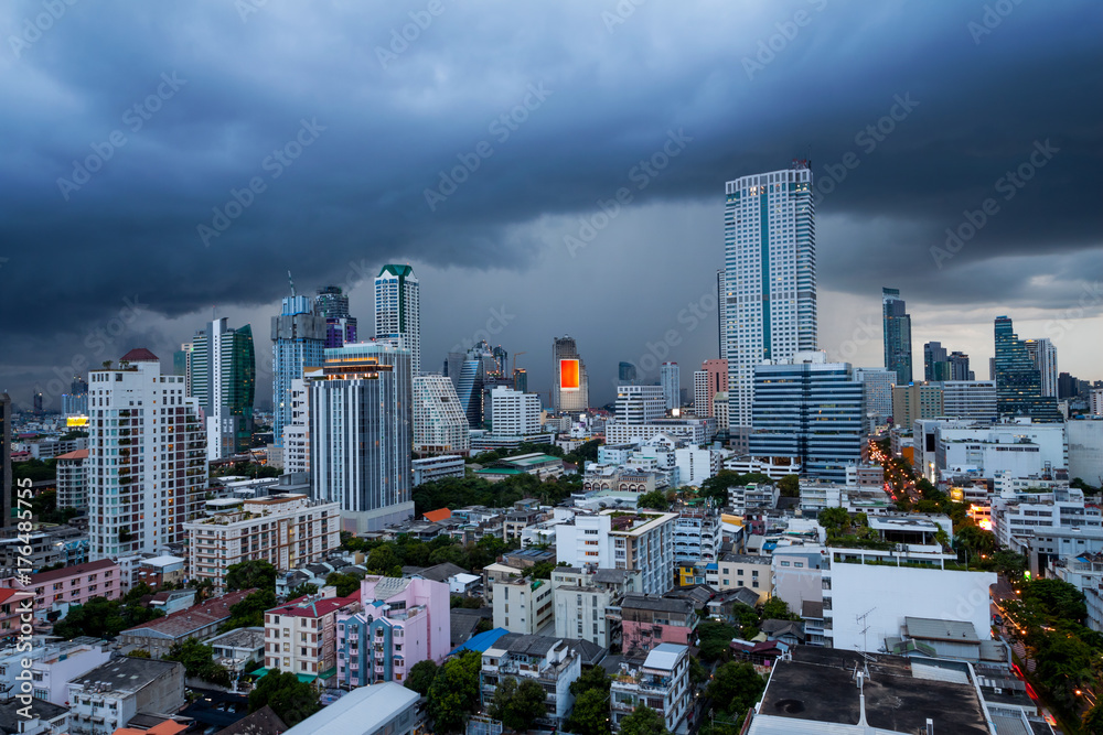 Aerial view of Bangkok downtown under the storm and cloudy sky