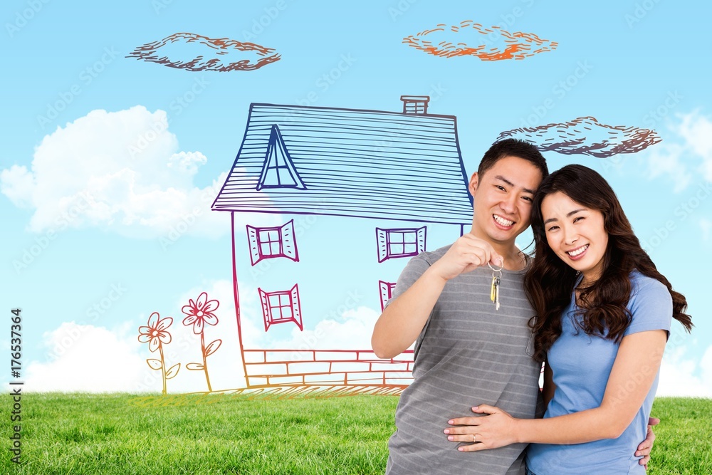 Composite image of portrait of happy young couple with keys