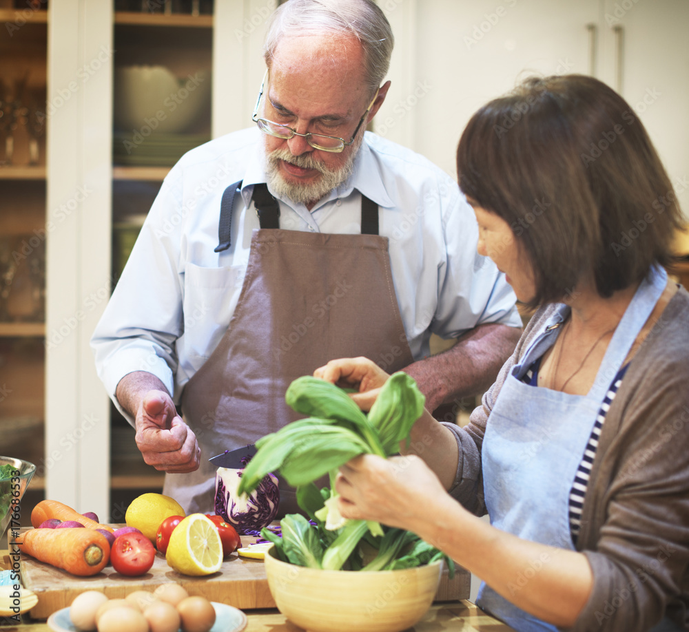 Senior couple cooking together