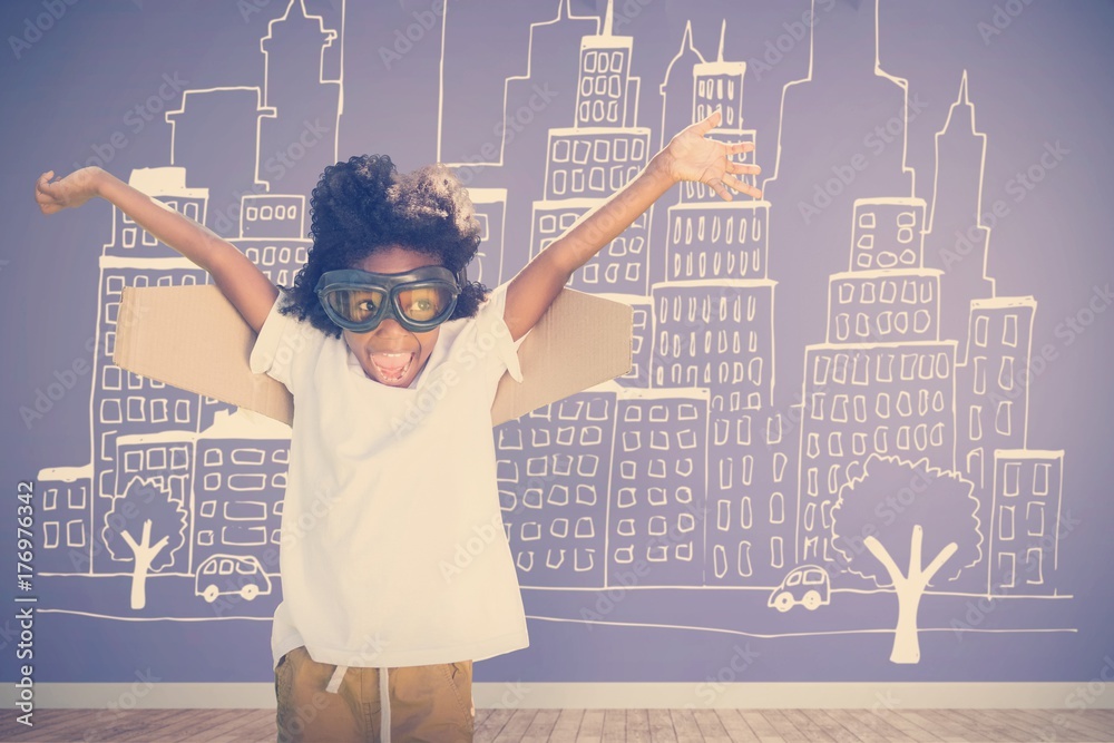 Composite image of playful boy with flying goggles looking away