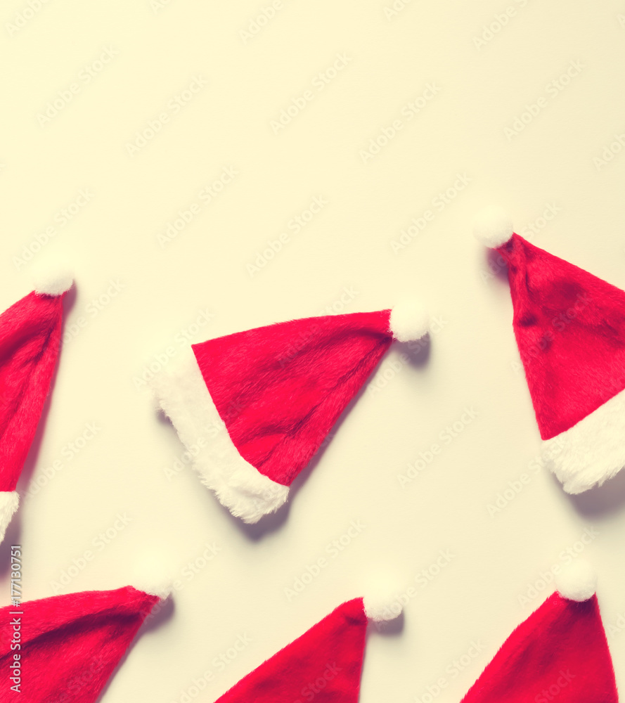 Santa hats flat lay Christmas background theme