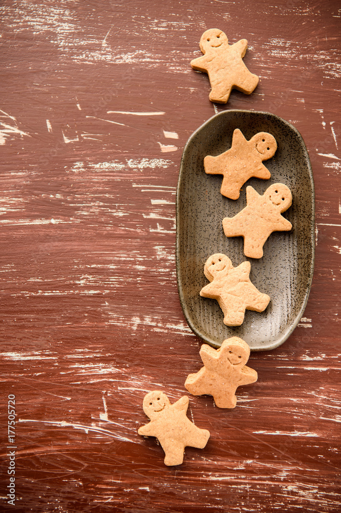 Christmas food. Gingerbread man cookies in Christmas setting. Xmas dessert