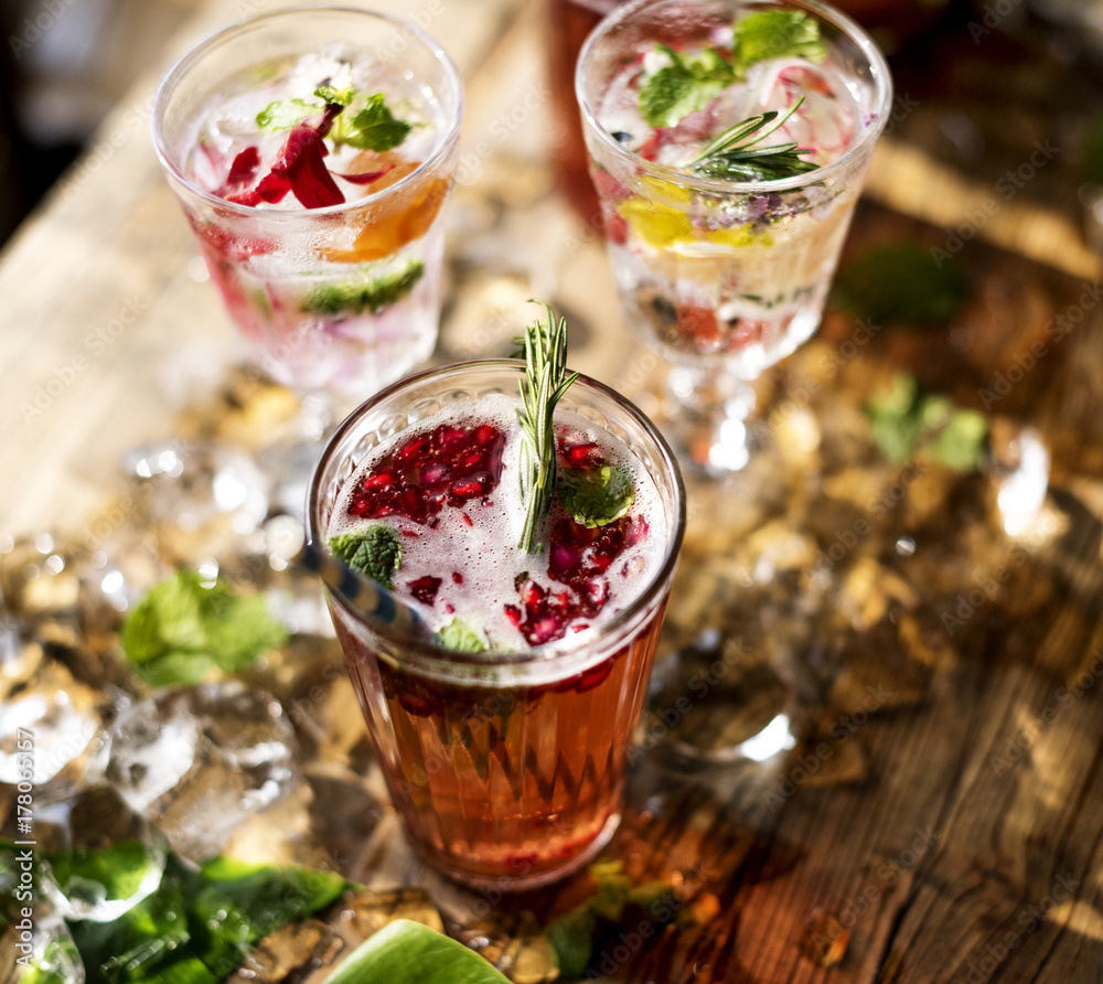 Summer cocktails with decorative flower petals