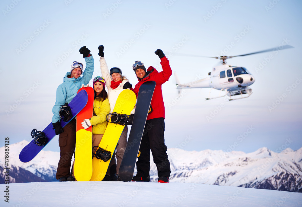 Snowboarders on top of the mountain