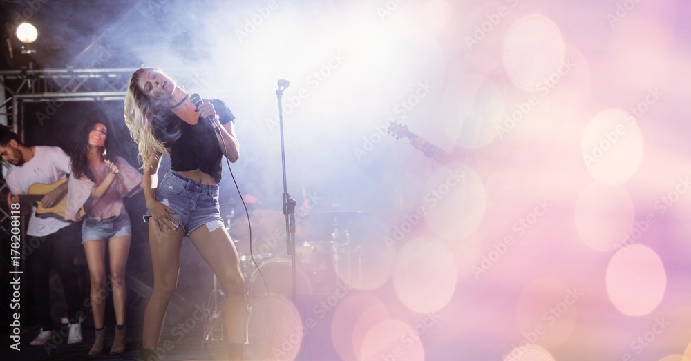 girl singing at concert with transition