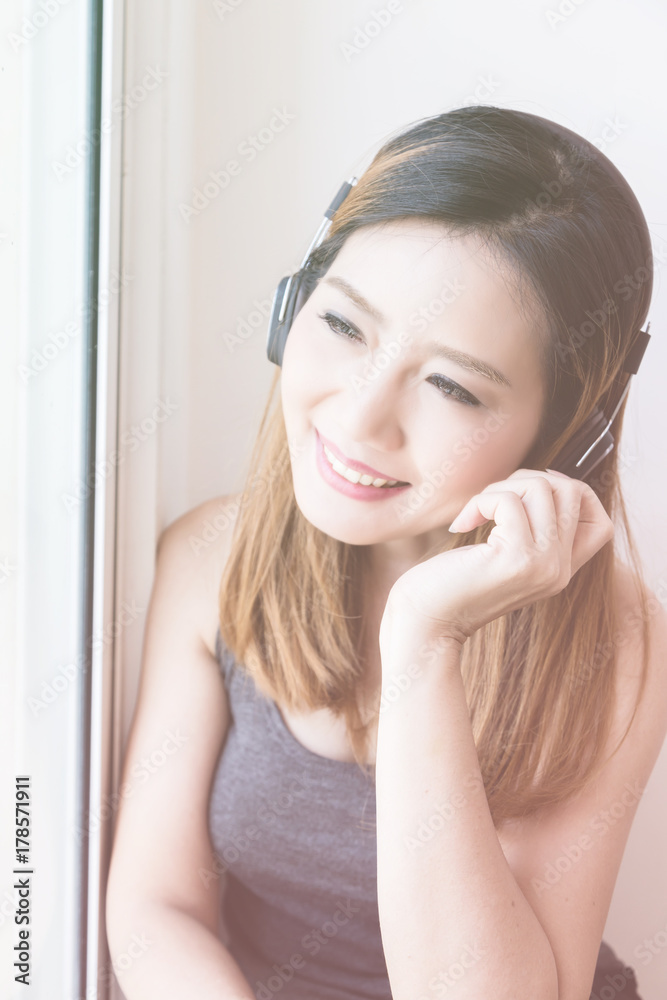 beautiful Asian Woman enjoy happy and laught  Cheerful with headphone Portrait Concept