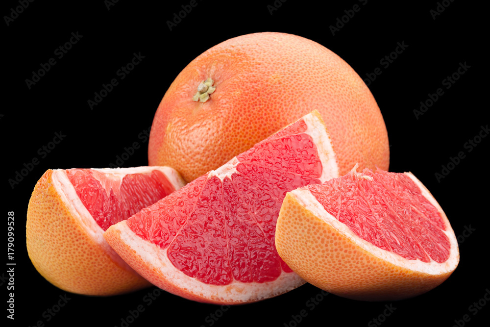 Orange grapefruit on black background