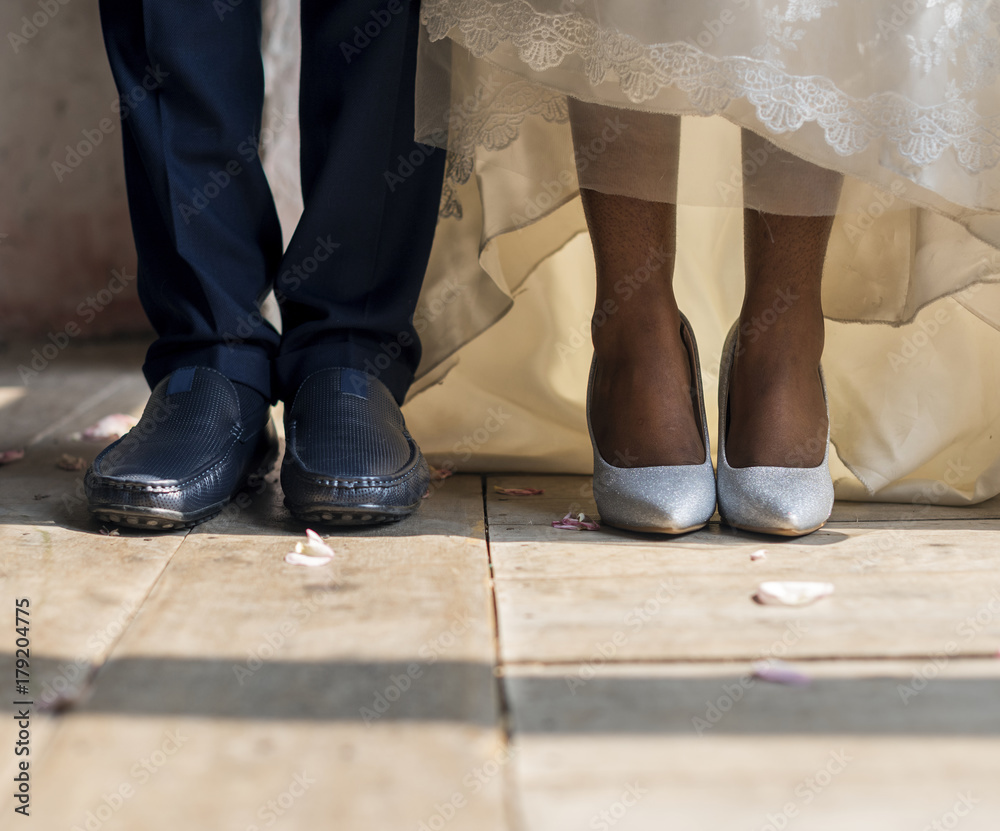 Bride and Groom Feet Standing on Wooden Floor