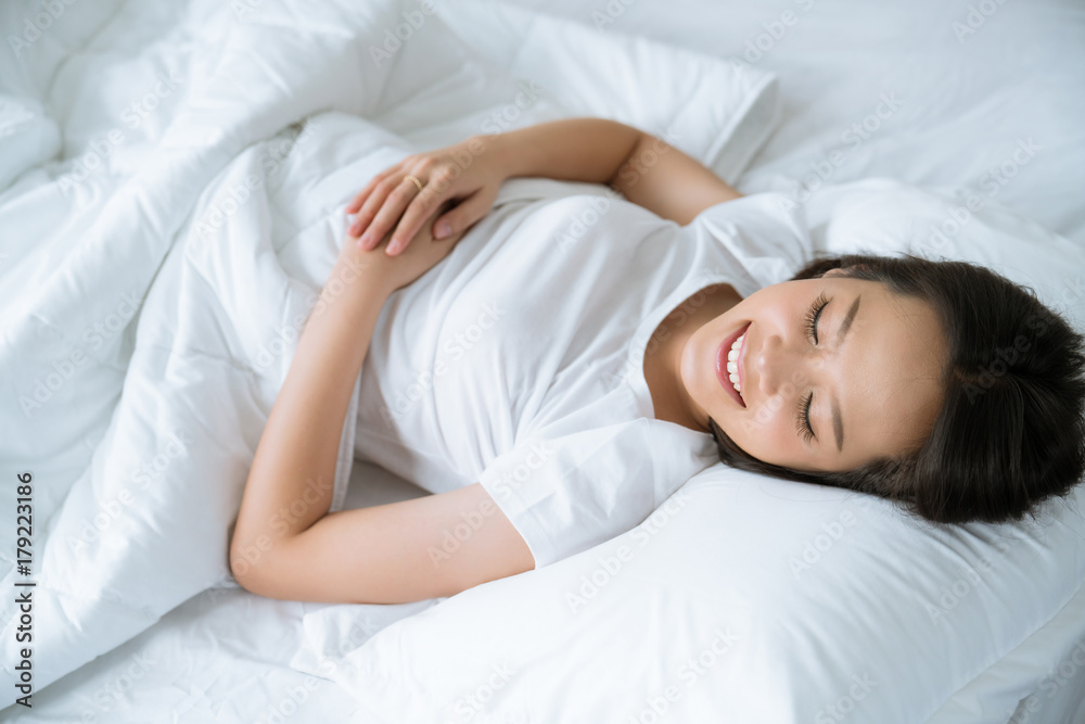 Asian women Sleeping happily and dreaming.