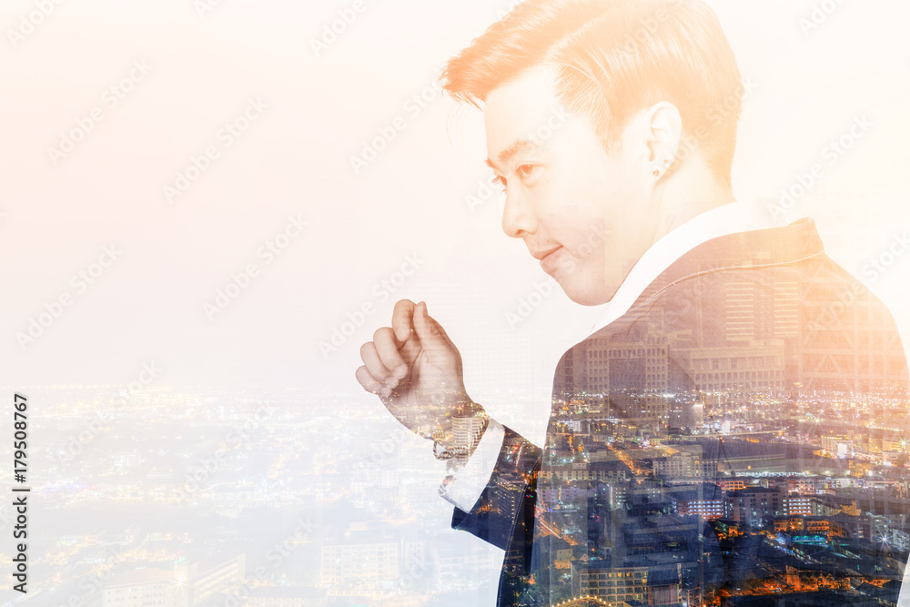 double exposure with image of businessman and cityscape night time with light flare effect business 