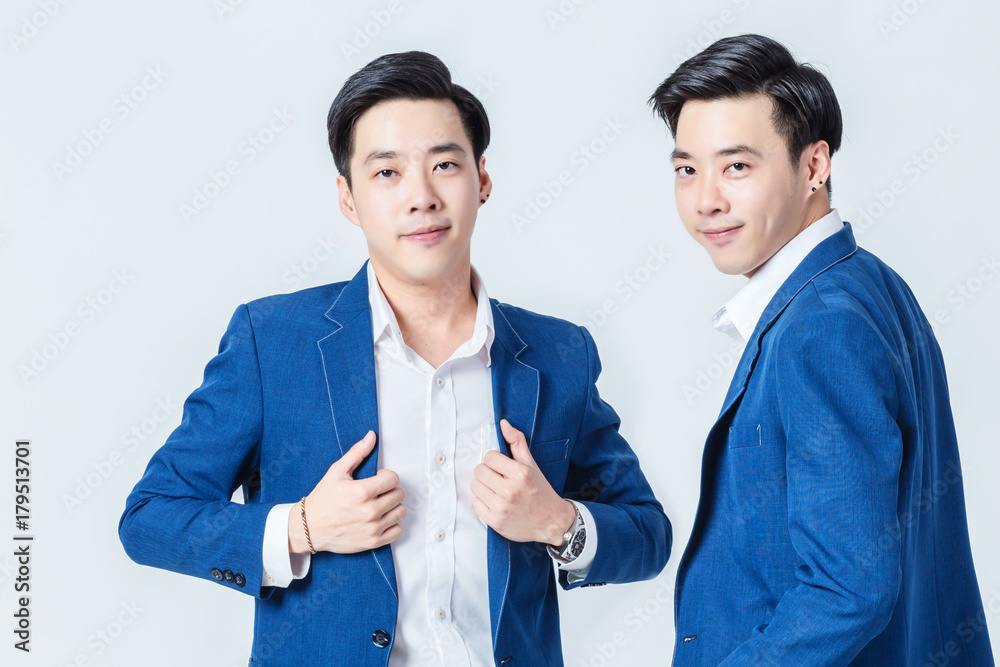 handsome asian business man blue suit smile with confident