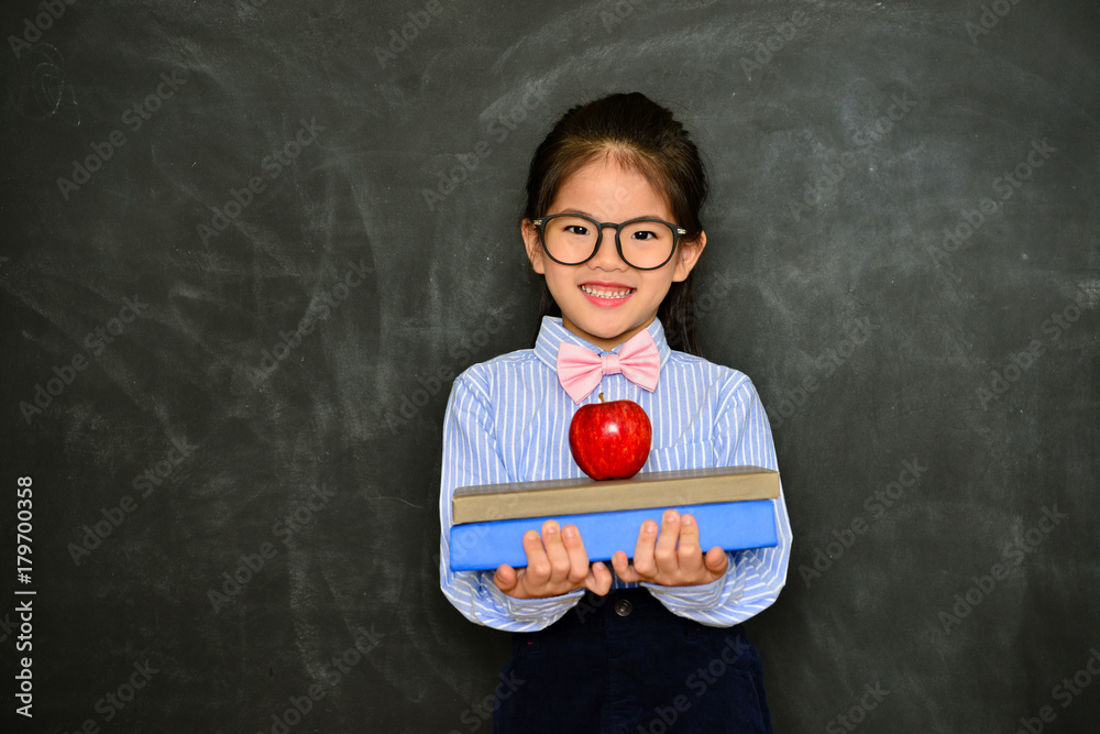 little girl showing back to school concept