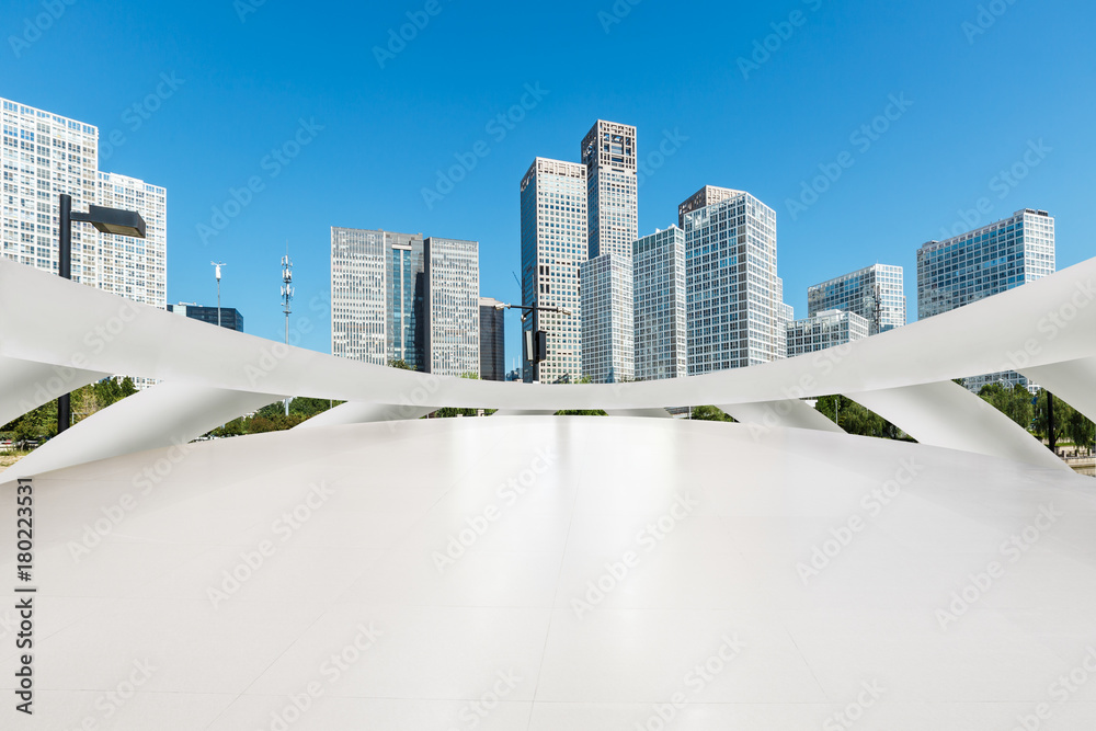 Empty square floor and modern city architecture