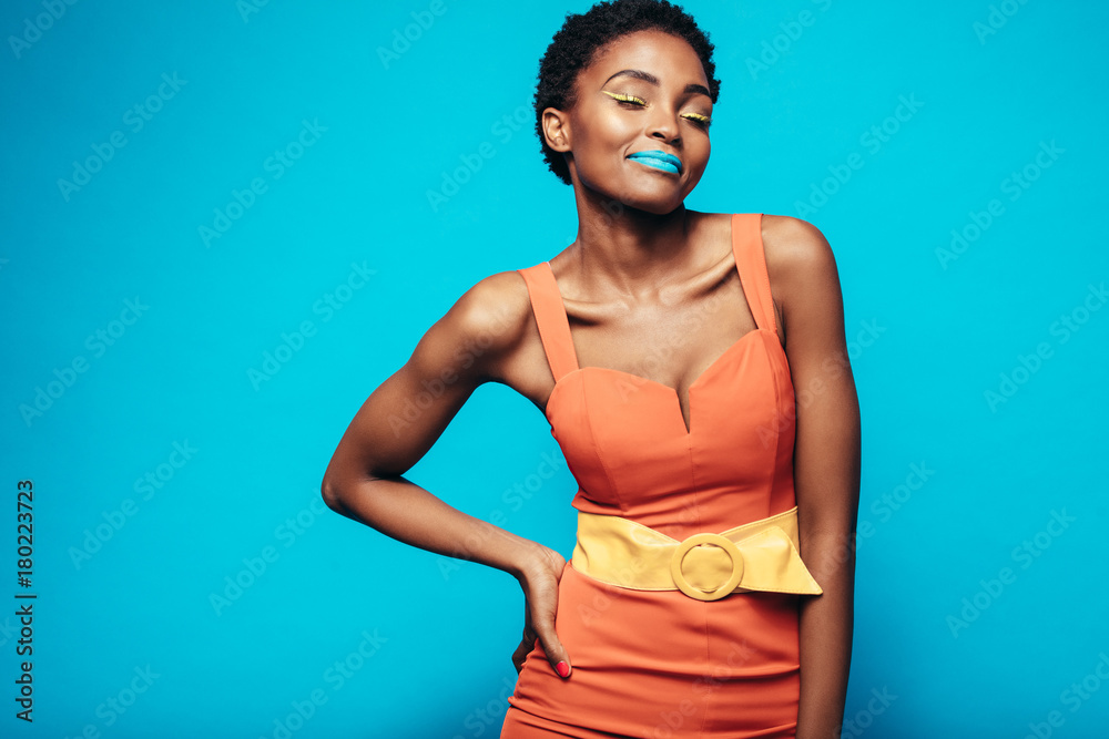 Beauty shot of woman with vibrant makeup