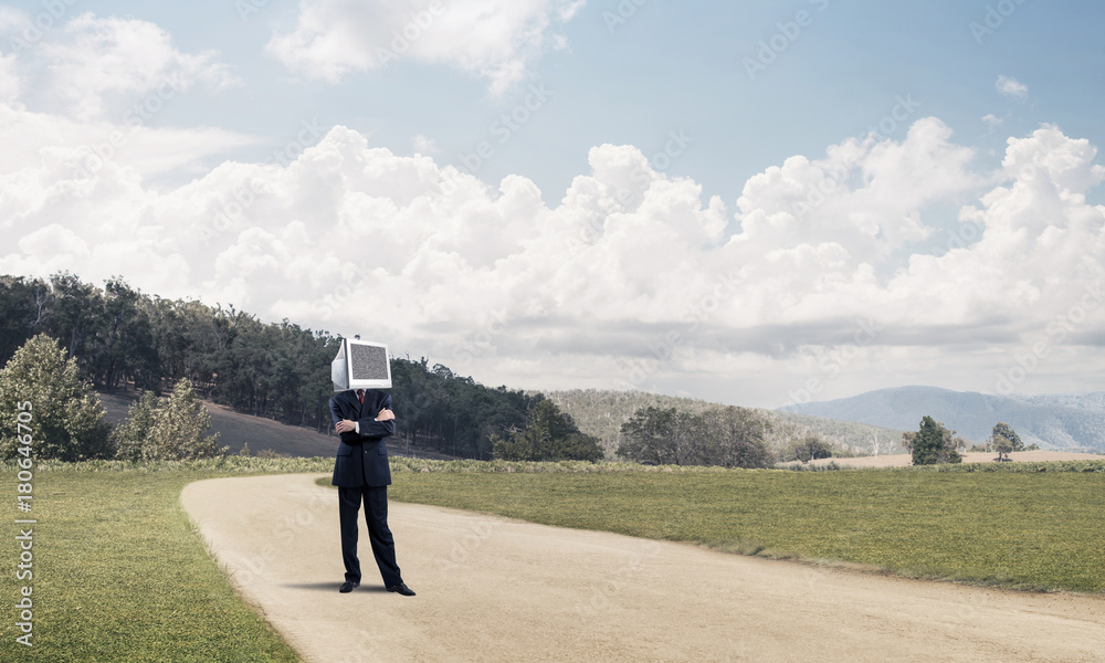 Businessman with monitor instead of head.