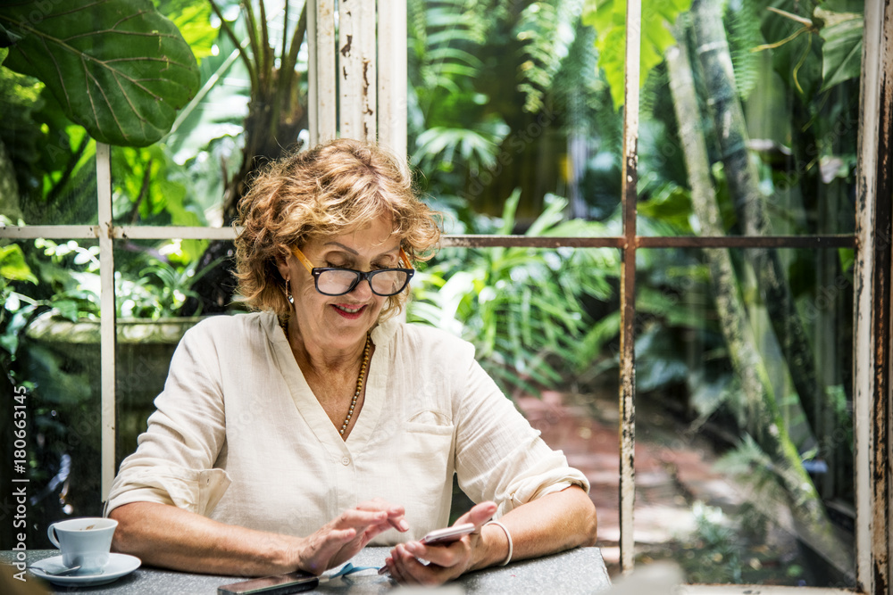 Senior caucasian woman using mobile phone