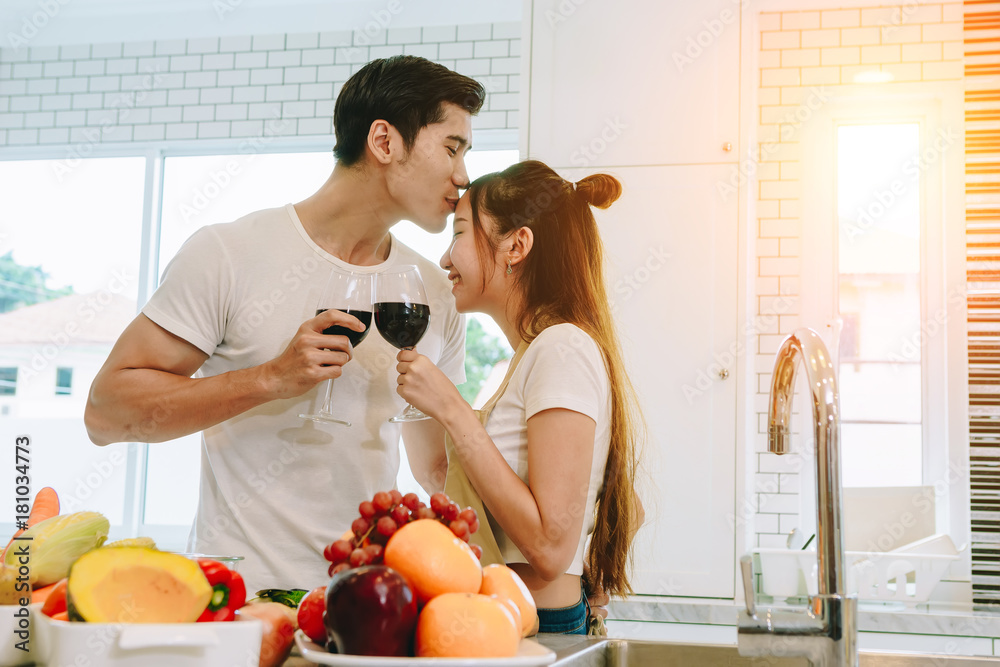 Asian teen couple are helping to make dinner. And bakery together happily. On Valentines Day in the