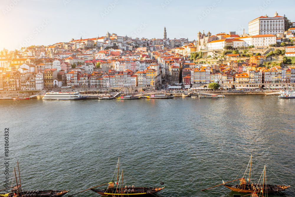 Landscape view on the old town on the riverside of Douro river in Porto during the sunset in Portuga