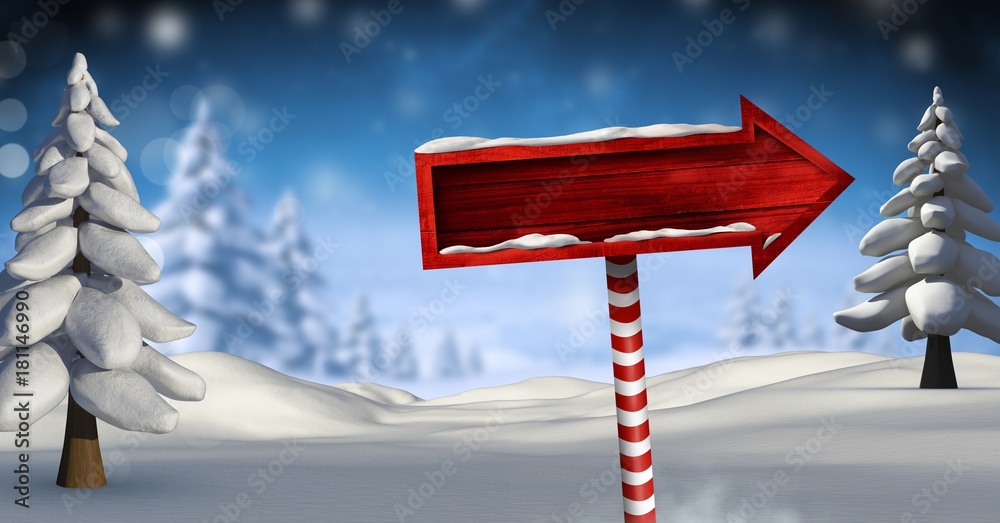 Wooden signpost in Christmas Winter landscape with trees