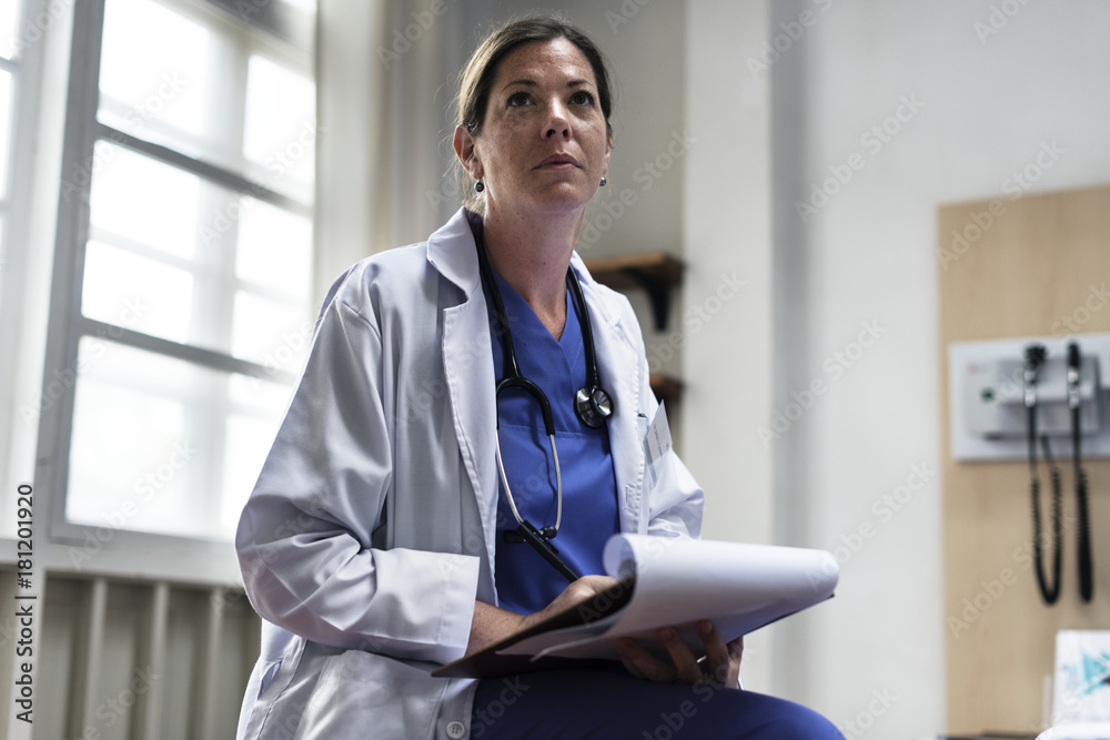 A Caucasian doctor working at a hospital