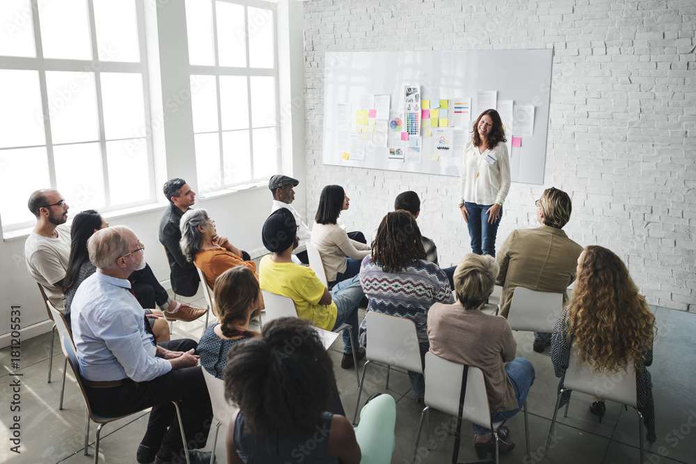 A group of diverse audience in a meeting