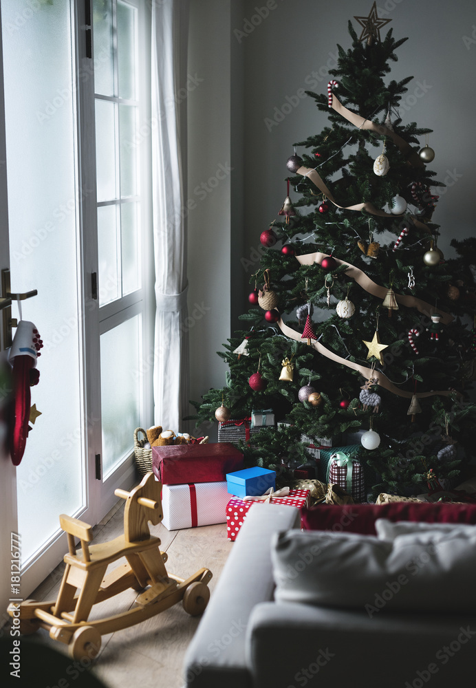 A decorated Christmas tree in a living room