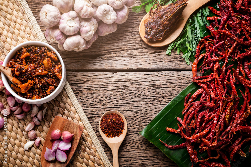 thai tradition style spicy dipping mad frop pork and shirmp with spicy and herb for ingredient on wo