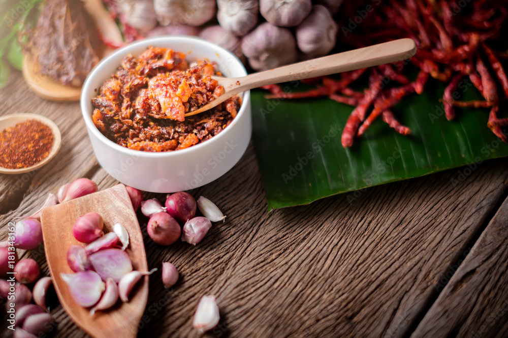 thai tradition style spicy dipping mad frop pork and shirmp with spicy and herb for ingredient on wo